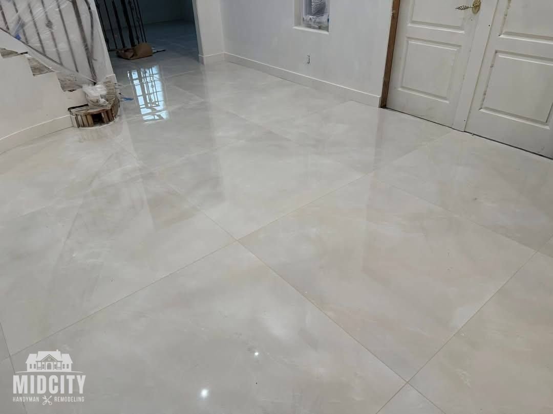 Open finished room with polished tile flooring